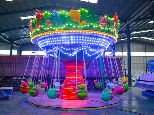 dinosaur amusement park flying chair