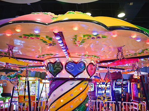 swing amusement ride with colorful lights